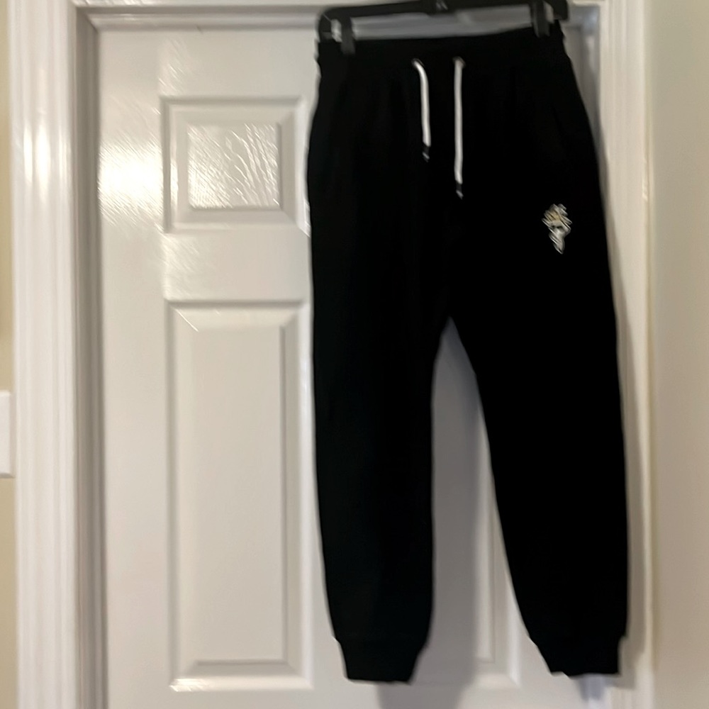 GOAT boys black sweat pants